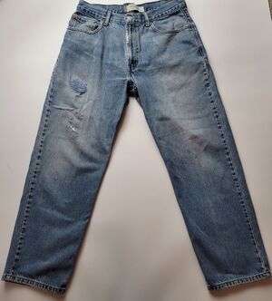Vintage Levis 550 Relaxed Fit Tapered Leg Light Wash Blue Jeans 34x30 Distressed